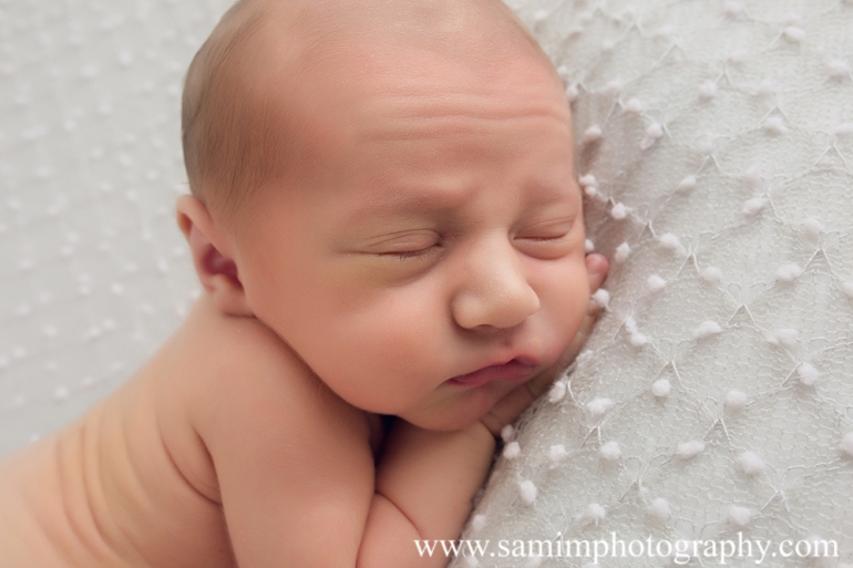 Ashburn GA newborn photographer precious studio newborn session tummy time close shot