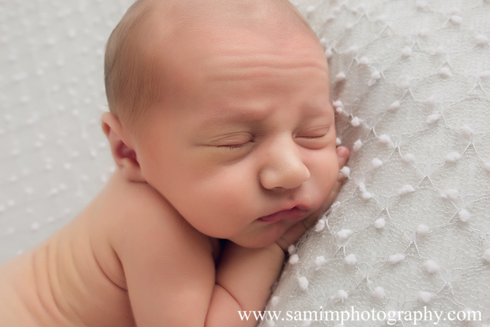 Ashburn GA newborn photographer precious studio newborn session tummy time close shot