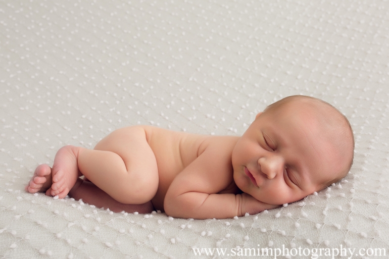 Ashburn GA newborn photographer precious studio newborn session tummy time 