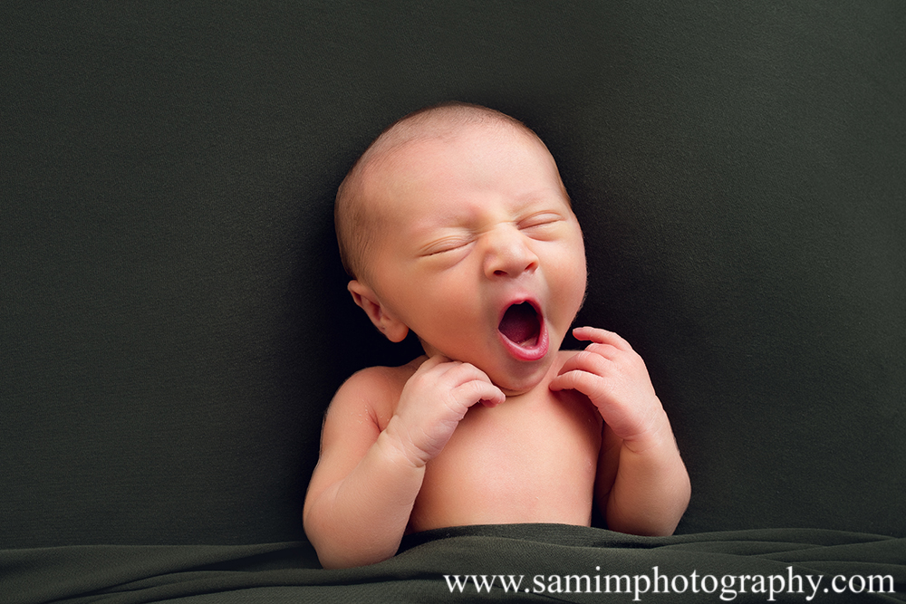 Ashburn GA newborn photographer precious studio newborn session baby yawn