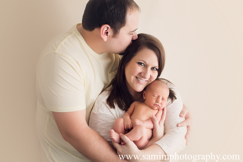Ashburn Ga Photographer precious studio newborn session daddy, mama, and son
