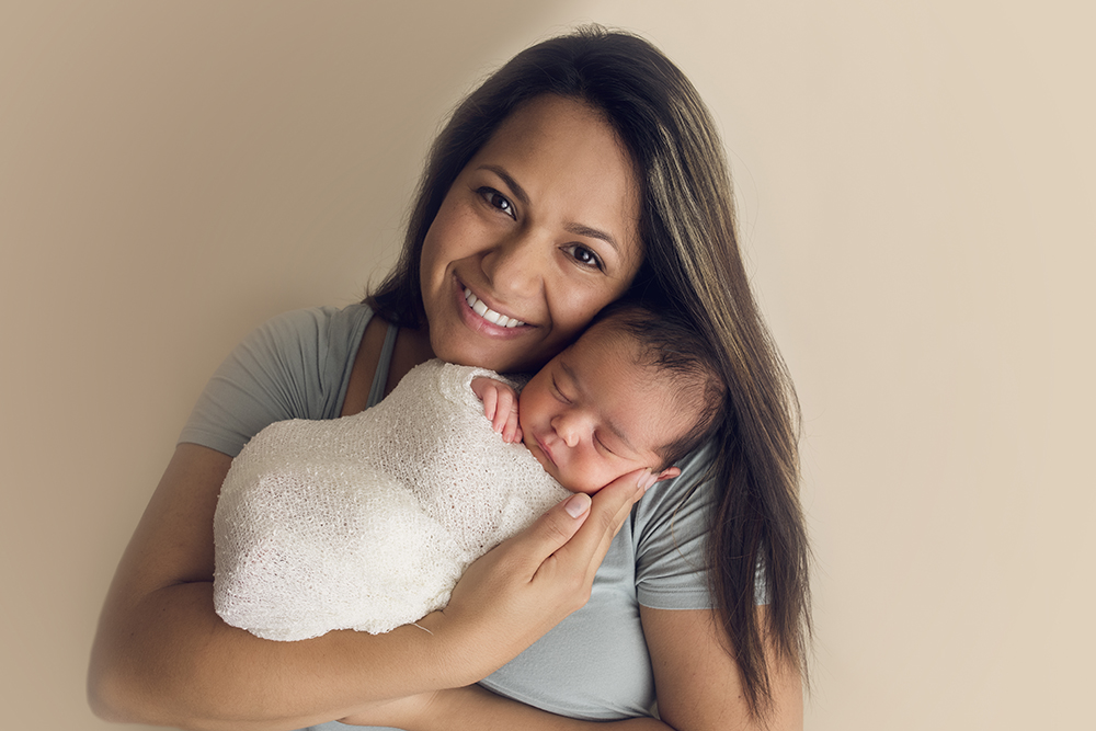 Cream Newborn Studio Session Mom and baby boy newborn posing