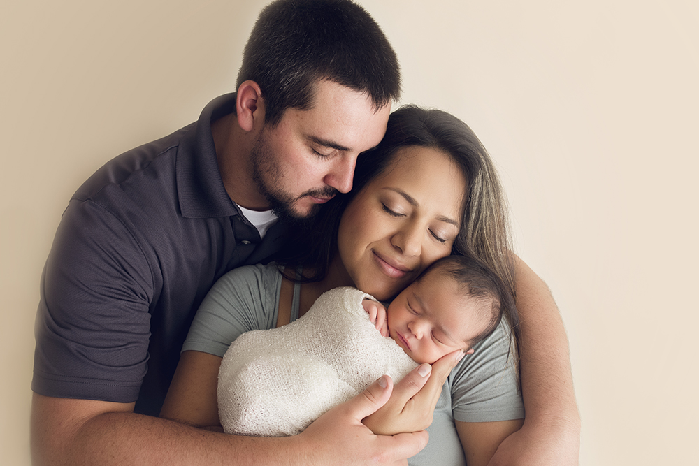 Cream Newborn Studio Session parents and baby newborn posing