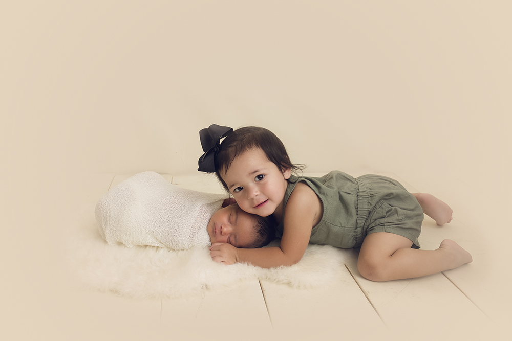 Cream Newborn Studio Session toddler and baby newborn posing