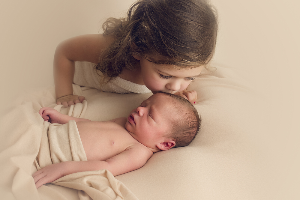neutral newborn session newborn sibling toddler image