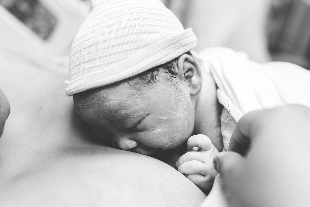 emotional birth at tift regional birth photographer Tifton birth photographer